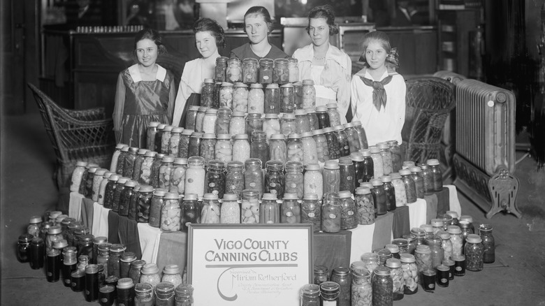 Women with canned goods