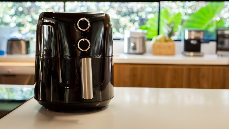 Electric air fryer appliance in a home kitchen