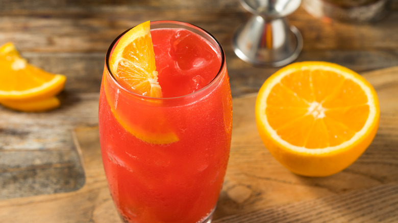 alabama slammer cocktail and orange half