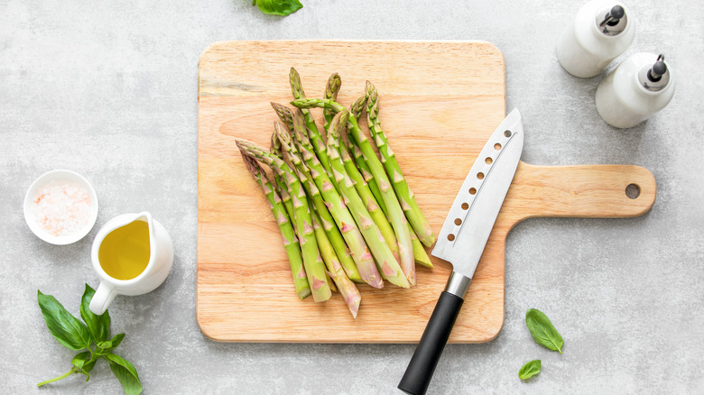 Asparagus on cutting board