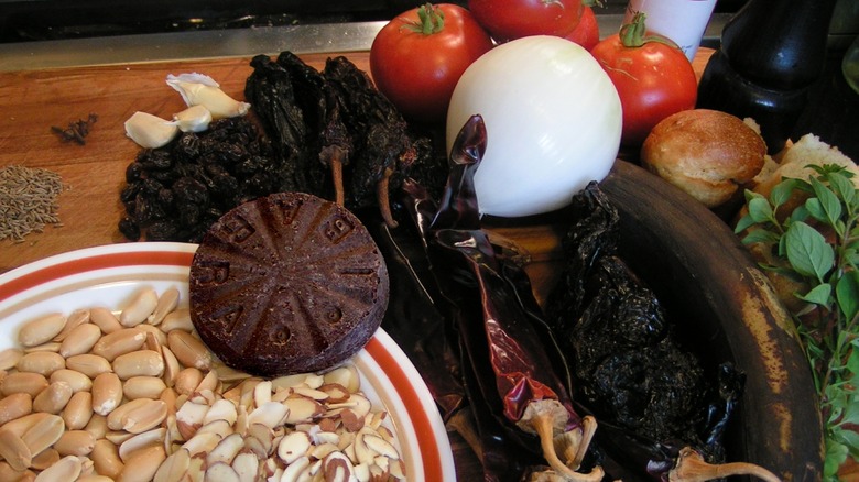 Ingredients for mole negro on cutting board