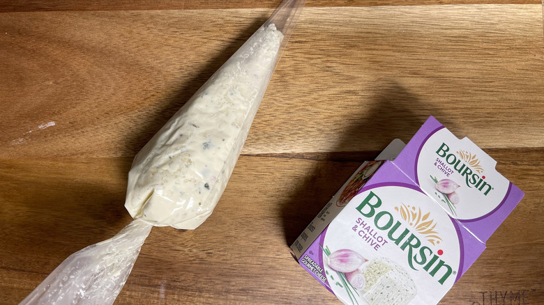 boursin cheese in piping bag