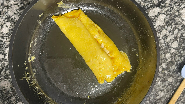 folded boursin omelette in skillet