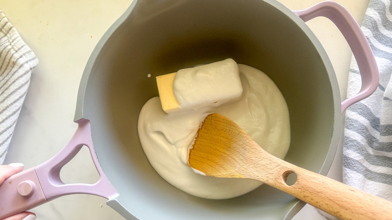 cream and butter in pot