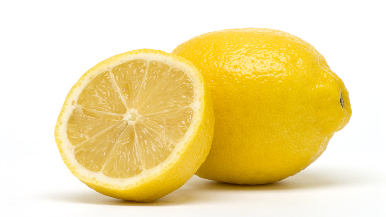 Whole and half lemon