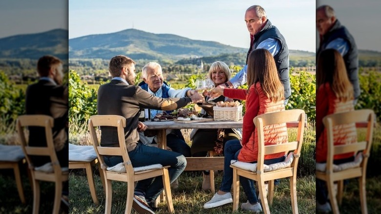 Hungarians raising wine glasses