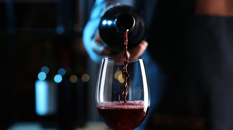 Red wine poured into glass