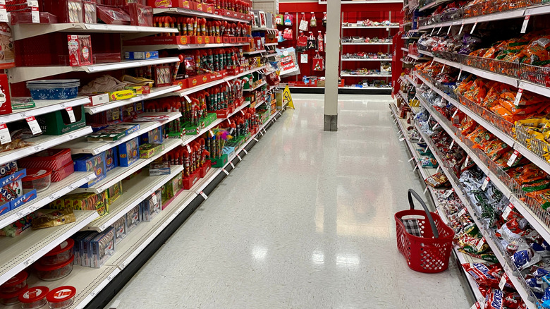 candy aisle at target with shopping basket