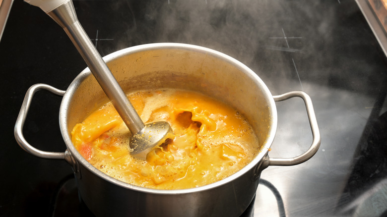 hand blender in soup pot