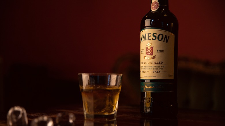 Bottle and glass of Jameson whiskey
