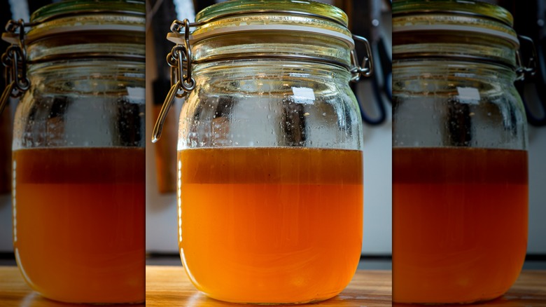 Bacon infused bourbon in a mason jar