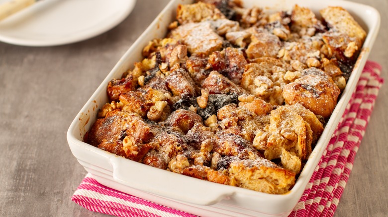 Dish of bread pudding on table