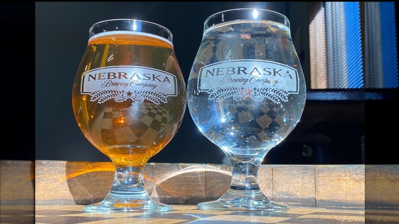 Nebraska Brewing Company glasses with beer and water