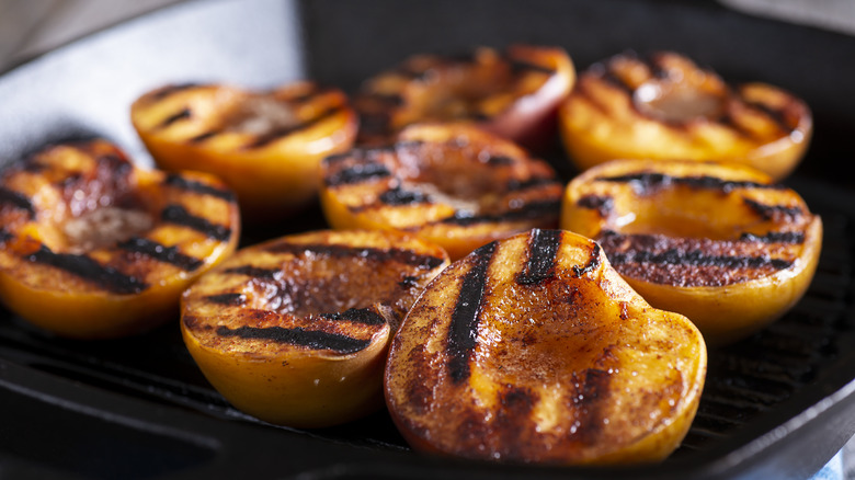 grilled peaches on skillet