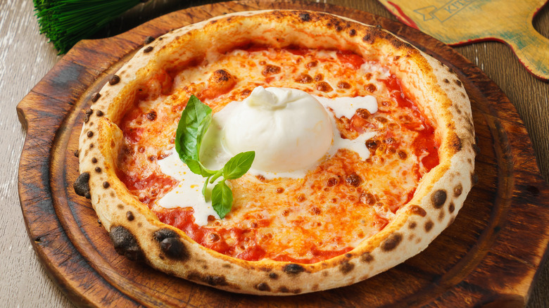 Pizza with burrata in middle