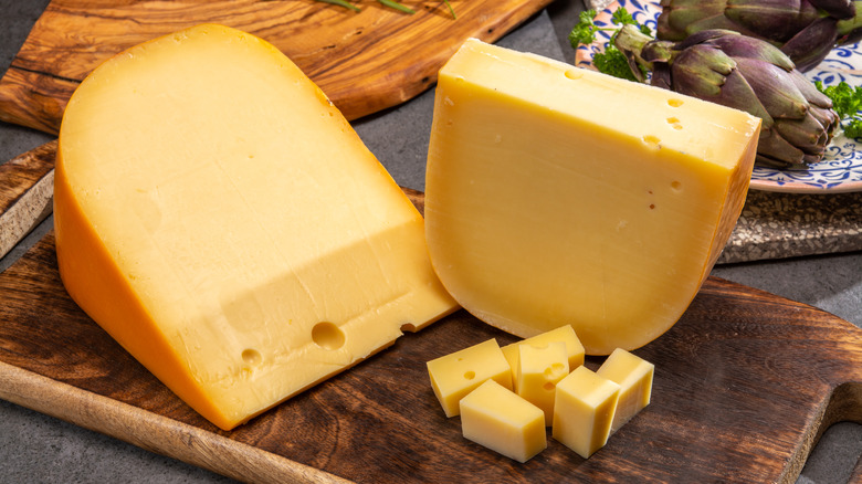 Gouda cheese on a wooden board