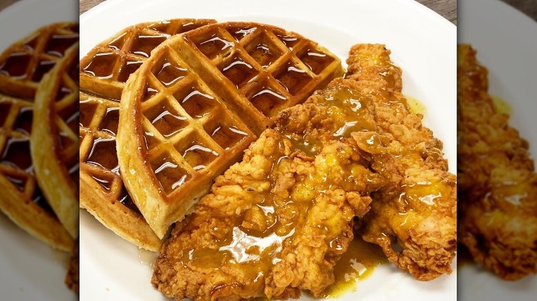 Chicken and waffles with syrup