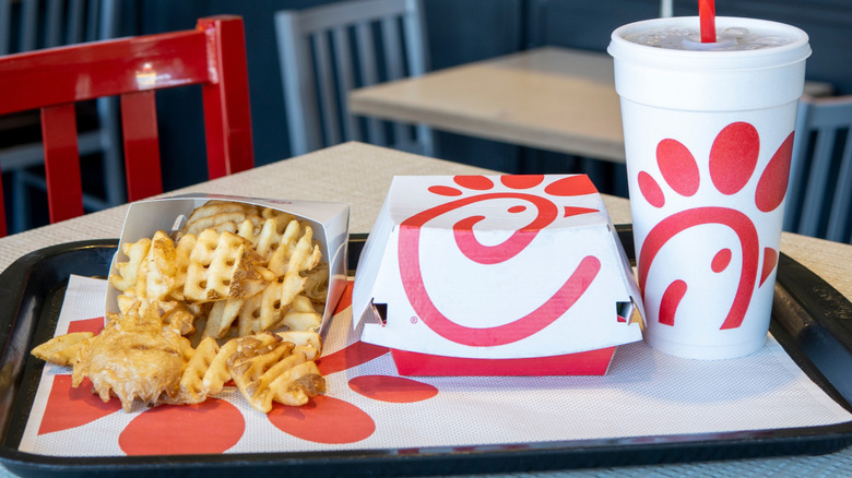 Chick-fil-A sandwich box with side of fries and a drink