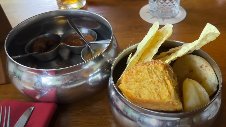 Close-up of Tiffins Bread Service