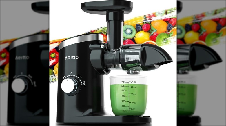 Aeitto Cold Press Juicer on white background with fruit graphic