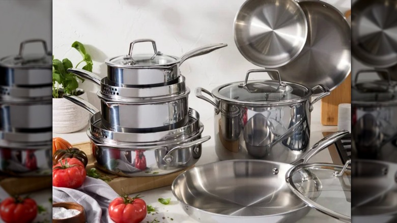 Henckels tri-ply clad stainless steel 12-piece cookware set with tomatoes