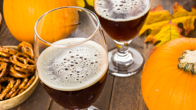 fall beer with pretzels and pumpkins