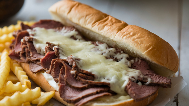 French dip sandwich with a side of fries