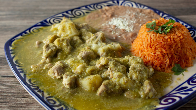 pork in chile verde with rice and beans