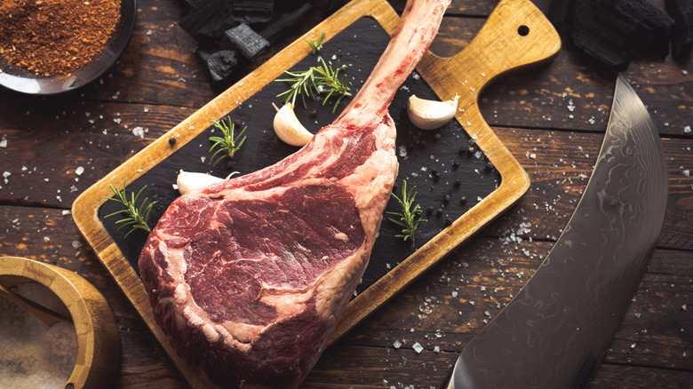 Dry aged steak on cutting board