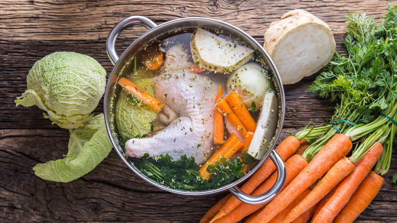Chicken and veggies in pot