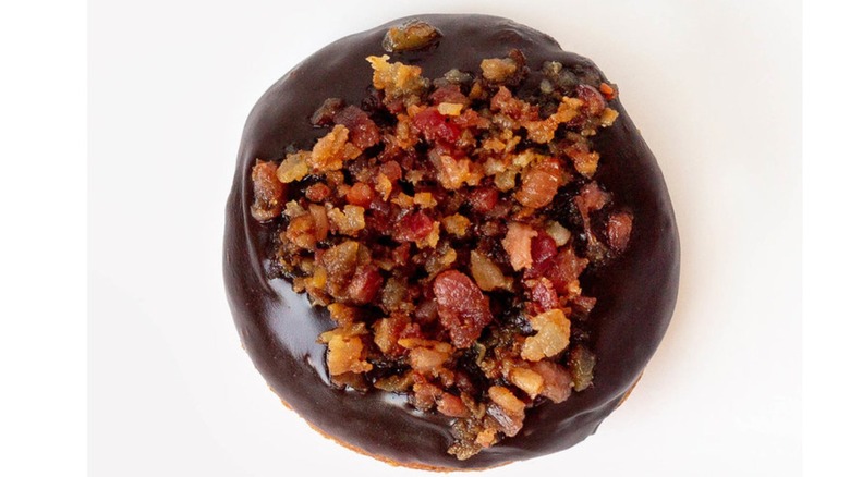 chocolate donut with bacon bits