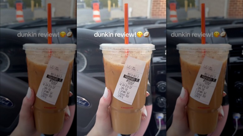 Person holding coffee in hand with order