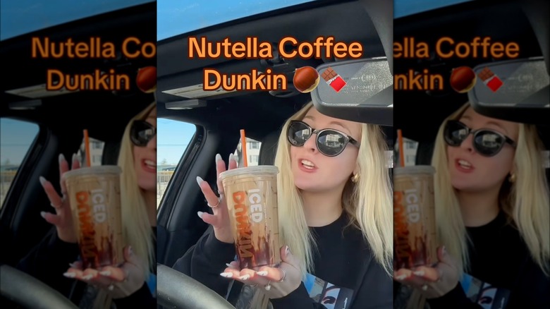 Person holding Nutella coffee