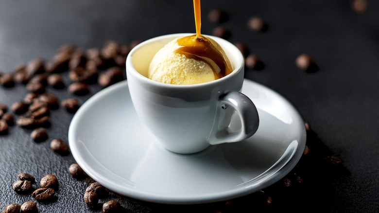 ice cream coated in coffee surrounded by coffee beans