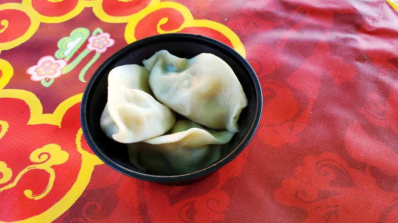 Disney dumplings black container