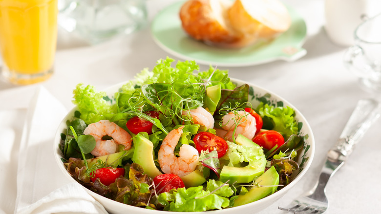 Summer salad with slices of bread