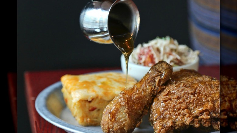 drizzling honey on fried chicken