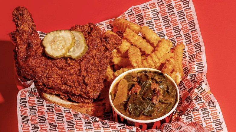 howlin' rays hot chicken with fries and greens