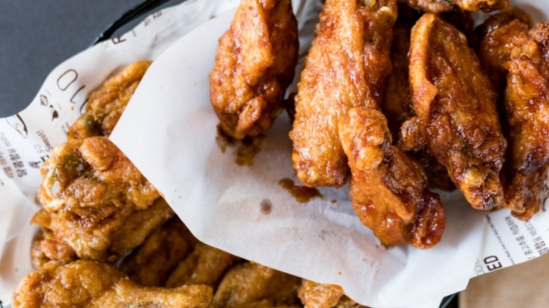 two baskets of glazed kyochon chicken