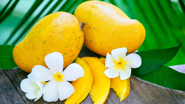 fresh mangoes and flowers