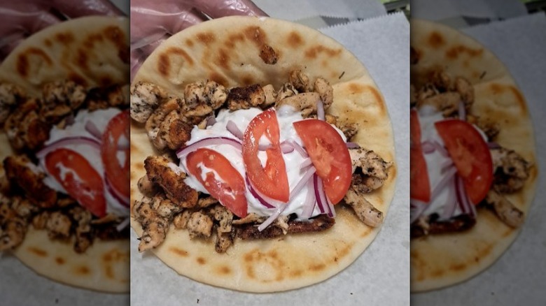 Gyro wrapped in pita bread