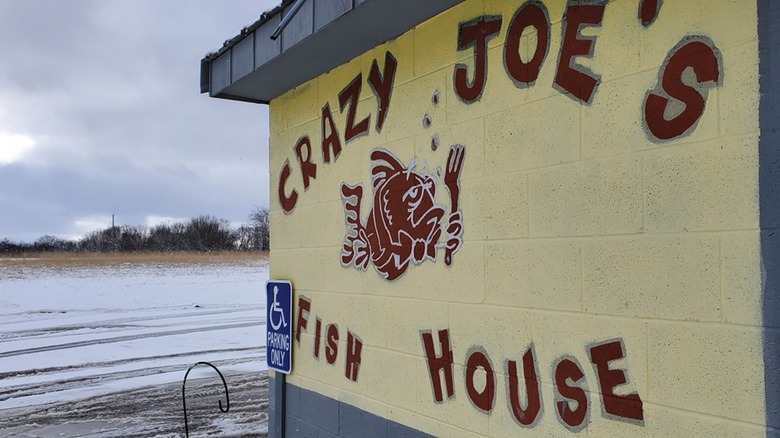 Crazy Joe's Fish House sign painted on outside of building