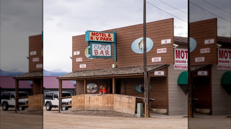 Outside of Chicks Bar and Motel building in Montana