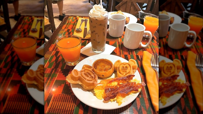 Plate of breakfast food from Boma Flavors of Africa buffet on colorful table