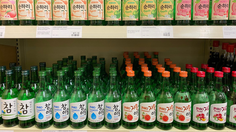 Bottles of Jinro soju on shelves