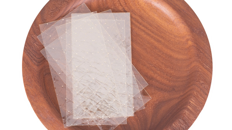 gelatin sheets on a wooden plate