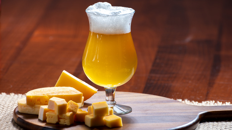 chalice of belgian beer and fries