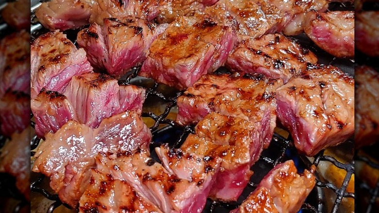 Marinated short ribs on a grill