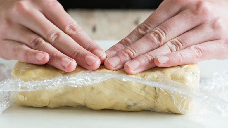 Rolling dough into log