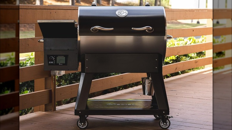 Recteq Pellet Grill Deck Boss 590 sitting on a wooden deck